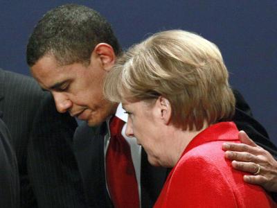 US-Präsident Barack Obama spricht mit Bundeskanzlerin Merkel während des G20-Gipfels. Foto: Olivier Hoslet/Archiv Was wusste Obama?