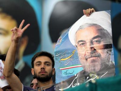 Im Iran gibt es mehrere Fraktionen und politische Flügel, aber kein klassisches Parteiensystem. Das will Ruhani ändern. Foto: Abedin Taherkenareh Ruhani-Fan