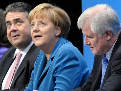 Die angehenden Koalitionspartner Gabriel, Merkel und Seehofer am 16. Dezember bei der Unterzeichnung des Koalitionsvertrages. Foto: Bernd von Jutrczenka Koalitionspartner