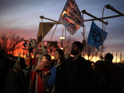 Demonstranten protestieren vor der COP25-Klimakonferenz. Proteste